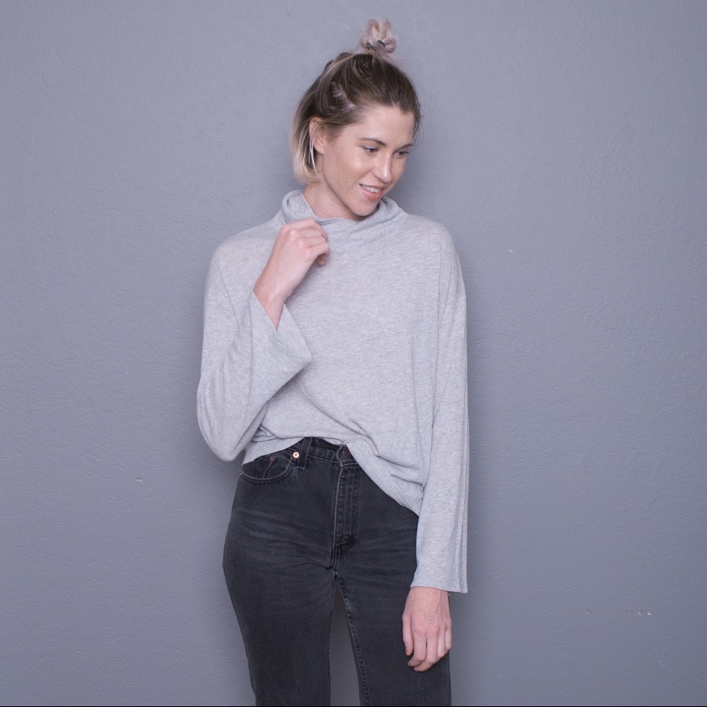 Grey baggy turtleneck. Unmarked size.